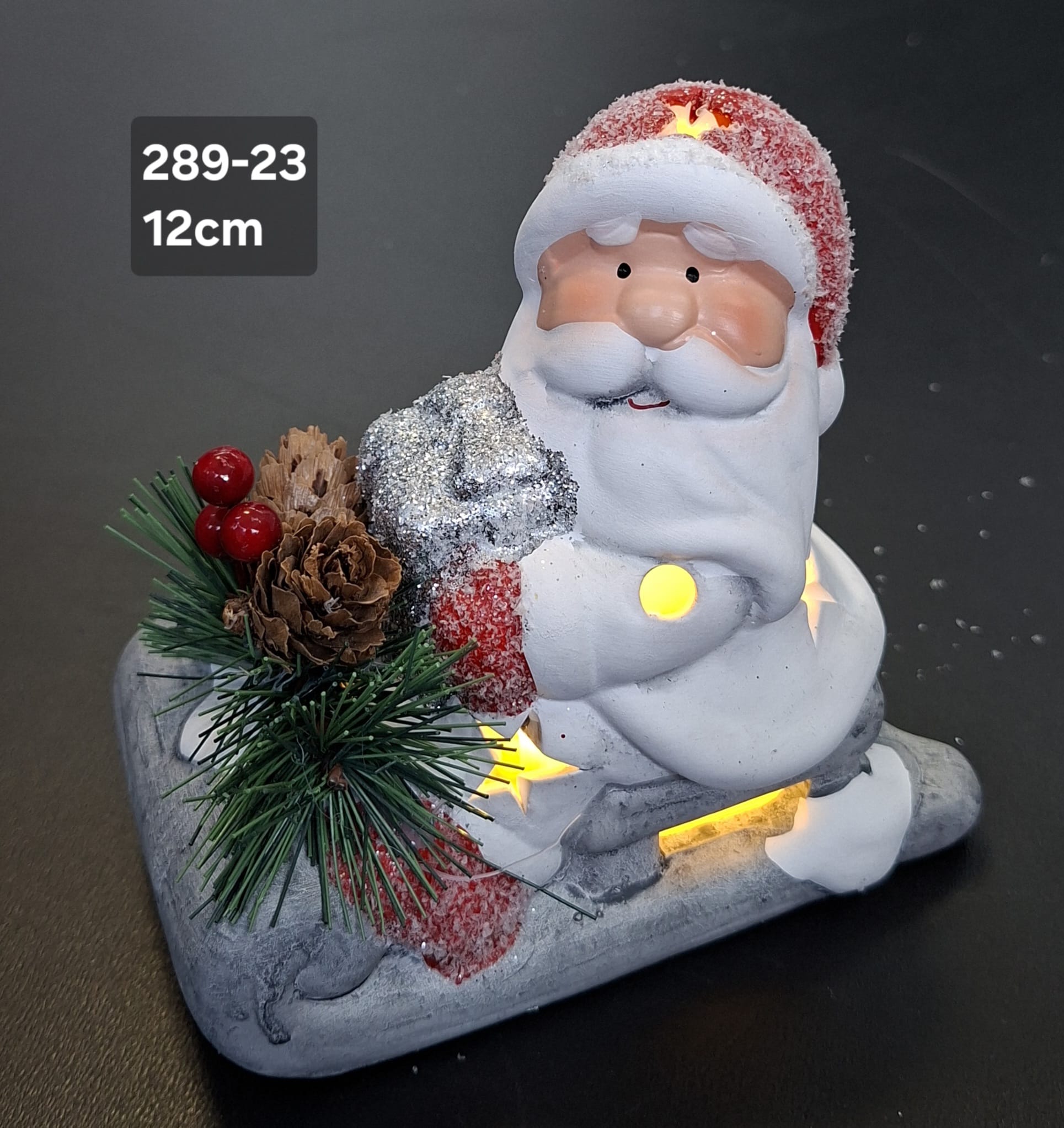 Decor ceramic Crăciun Moș Crăciun pe sanie LED - 12cm